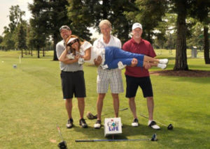 Golfers goofing off at fundraiser for Tulare-Kings Right to life.